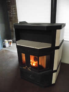 Image of pellet stove giving off a warm glow