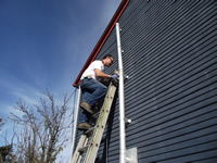 Image of installing exterior vent ductwork