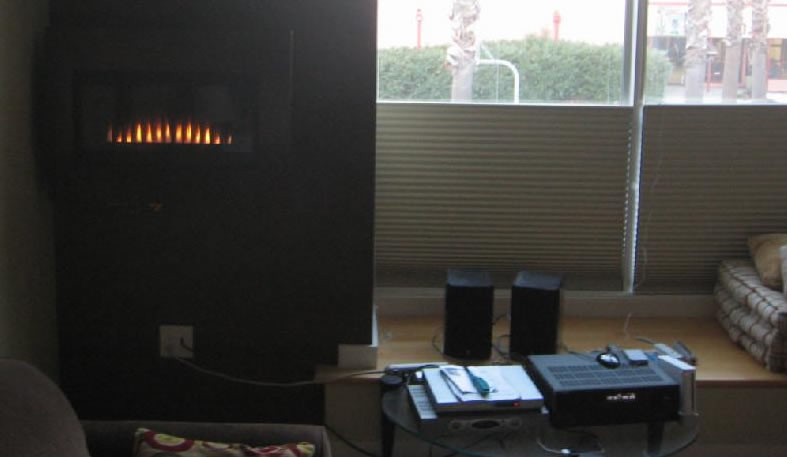 A Wall Mounted Gas Fireplace saves precious floor space